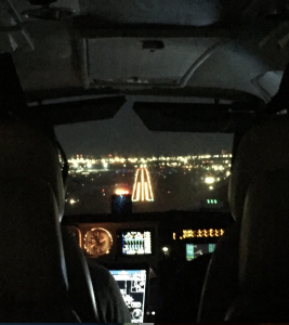 landing in savannah at night on a lit runway